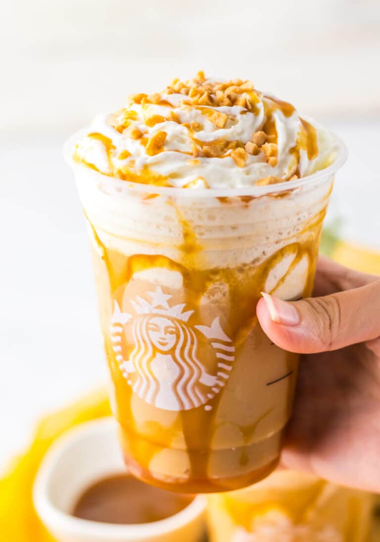 Copycat Starbucks Caramel Ribbon Crunch Frappuccino in hand