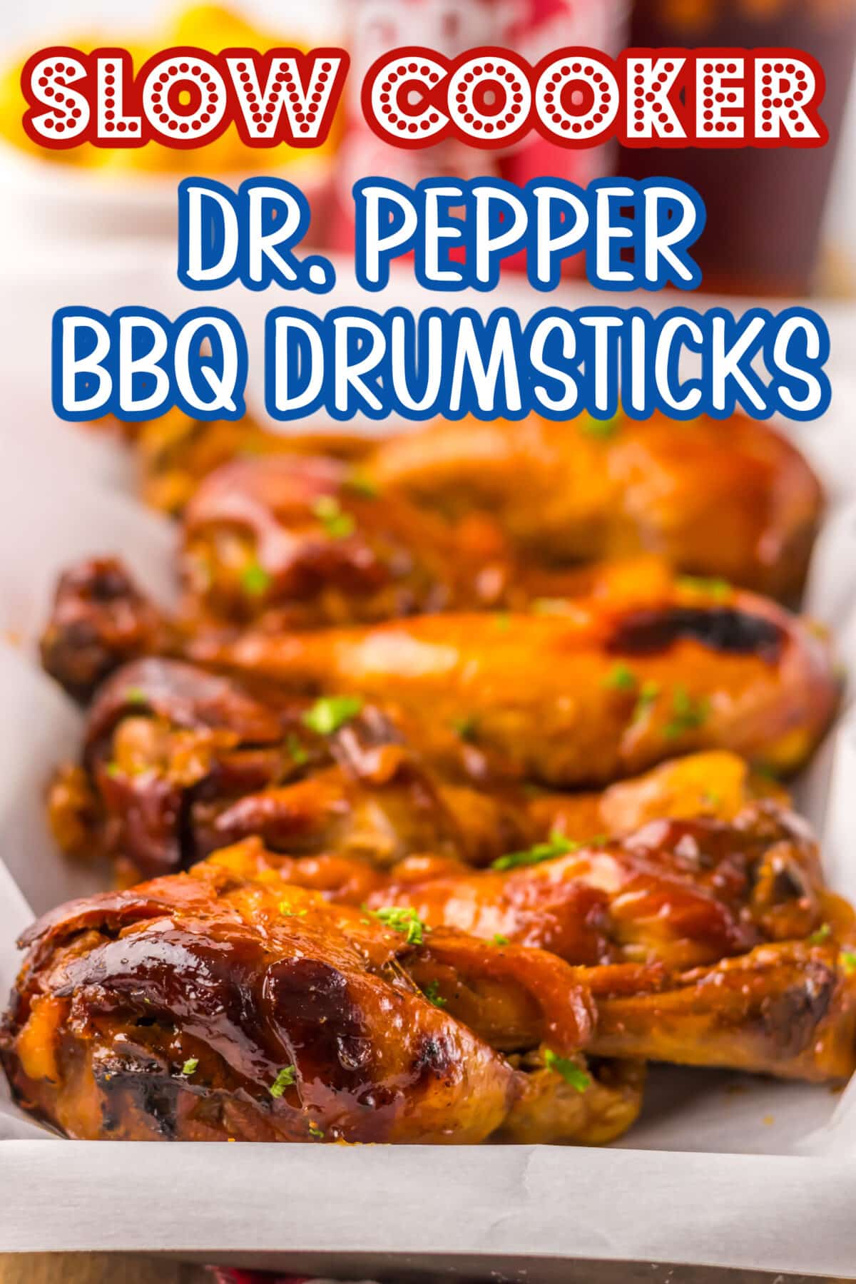 Slow cooker BBQ drumsticks glazed with Dr. Pepper sauce and garnished with parsley