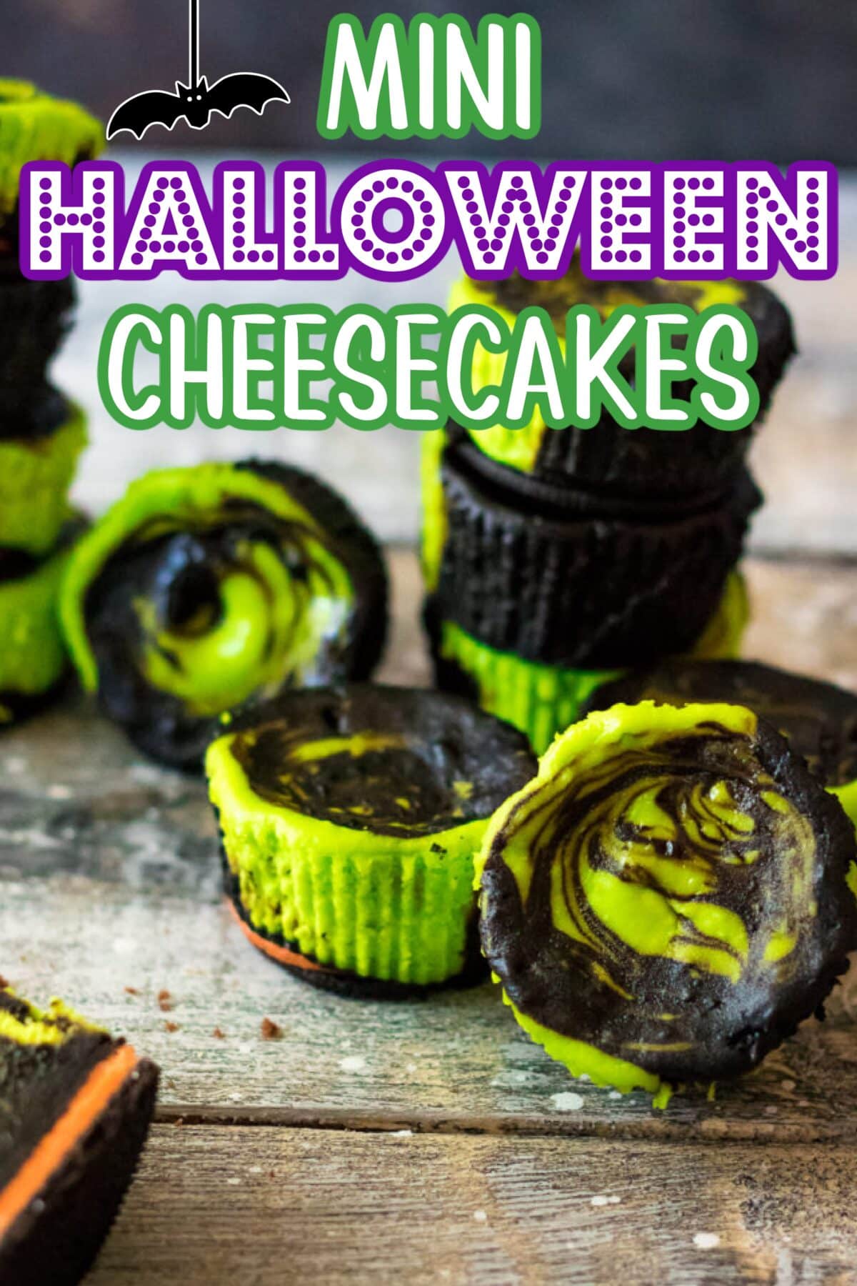 Mini Halloween cheesecakes decorated with spooky toppings like candy eyes, chocolate drizzle, and festive sprinkles.