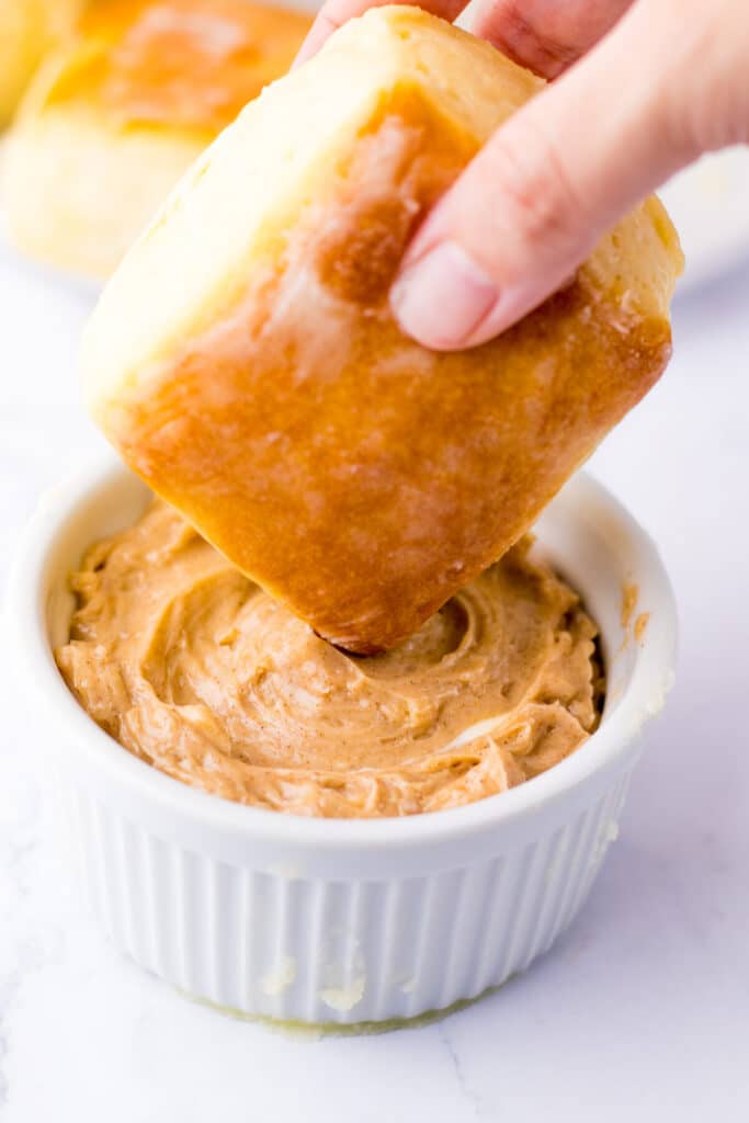 Copycat Texas Roadhouse Rolls dipped