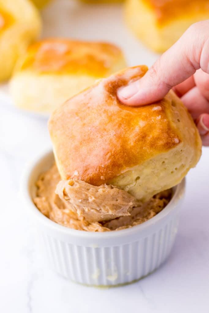 Copycat Texas Roadhouse Rolls dipped