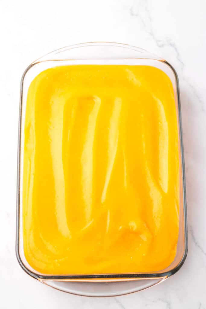 Orange Creamsicle Poke Cake orange layer