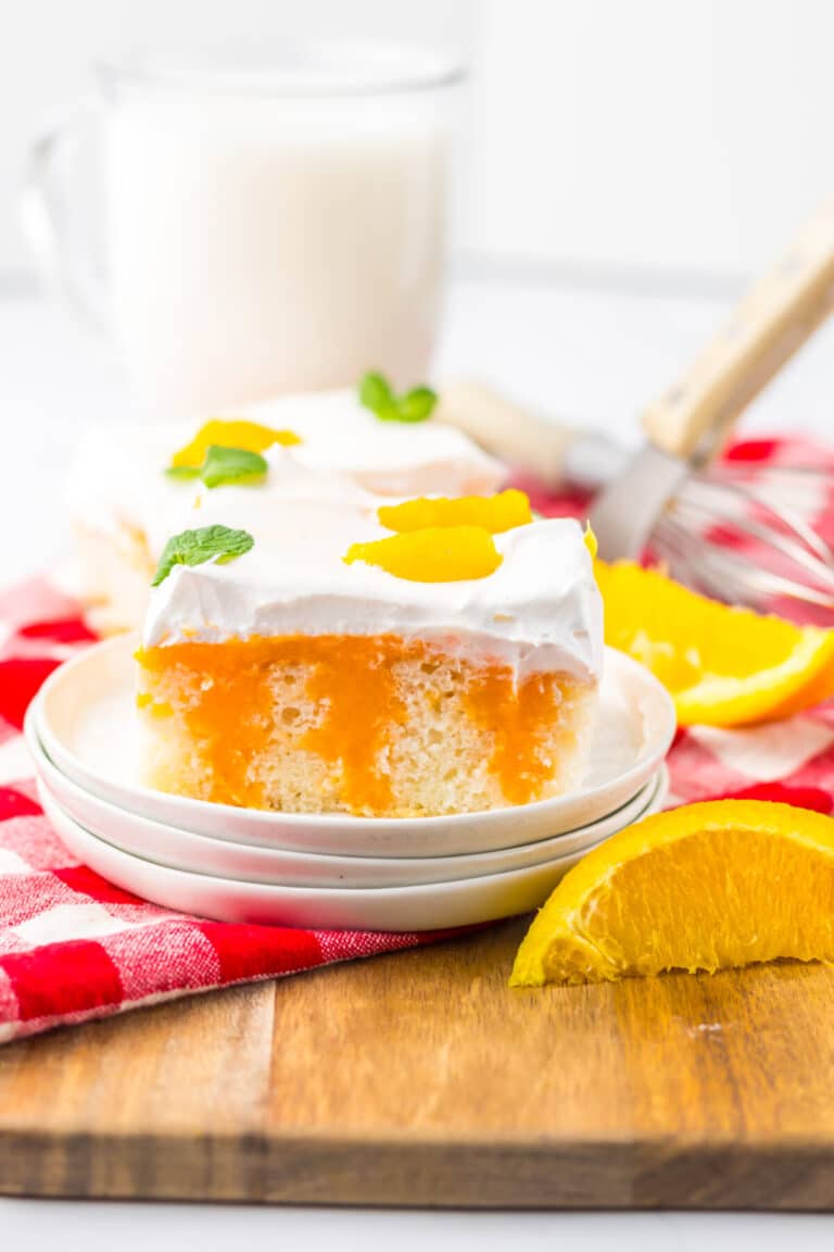 Orange Creamsicle Poke Cake plated