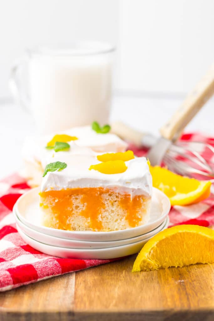 Orange Creamsicle Poke Cake plated
