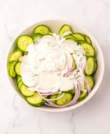 Creamy Cucumber Salad in bowl to be mixed