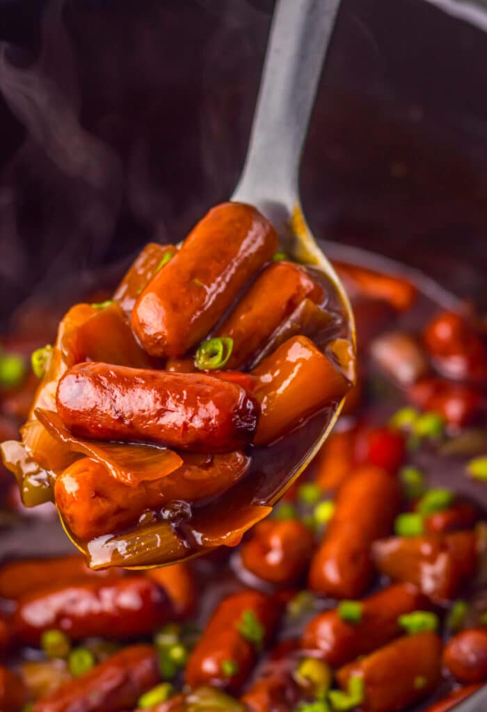 Slow Cooker Hawaiian Lil Smokies in spoon