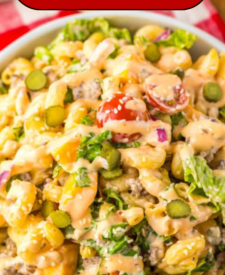 Big Mac Pasta Salad made with pasta, seasoned ground beef, cheese, lettuce, pickles, and creamy special sauce dressing.