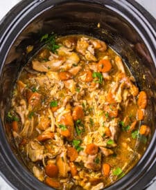 Hearty chicken pot roast with vegetables in a slow cooker
