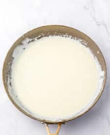 Close-up of creamy sauce in a pan.