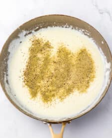 Close-up of creamy sauce in a pan.