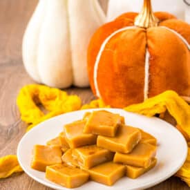 Plate of homemade pumpkin spice caramels cut into bite-sized squares