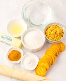 Mock apple pie filling ingredients in small white bowls on white background