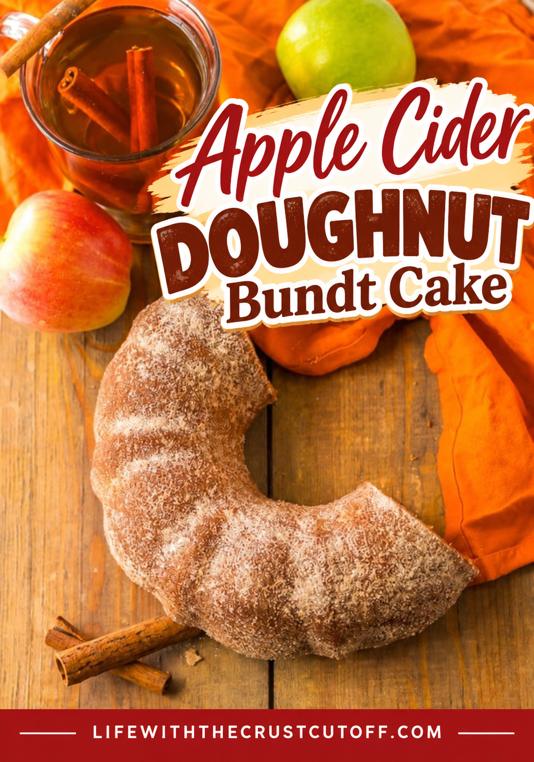 Apple Cider Doughnut Bundt Cake coated in cinnamon sugar with fresh apples, apple cider, and cinnamon sticks.