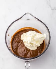 Whipped cream folded into chocolate silk filling for sheet pan pie