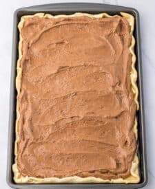 French silk pie filling spread in baked sheet pan crust for slab pie dessert