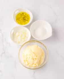 Raw ingredients in bowls for copycat Filet-O-Fish sandwiches.