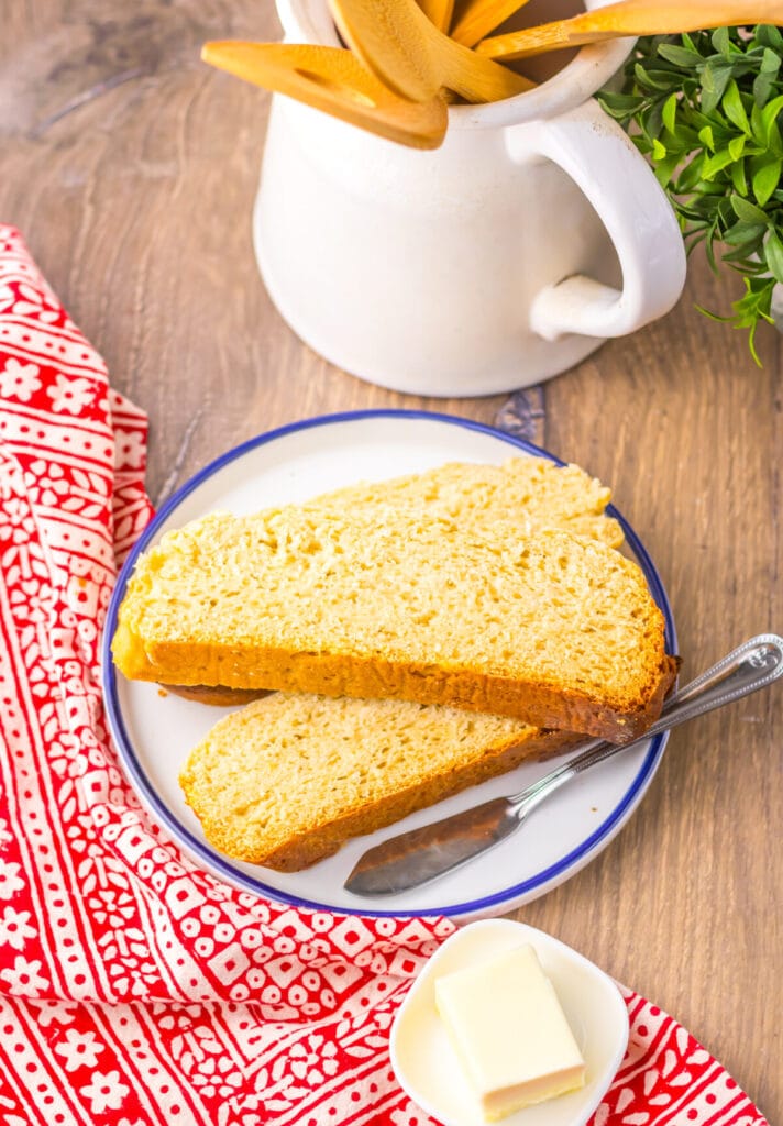 Slow cooker sourdough-style bread sliced to show soft, airy texture.