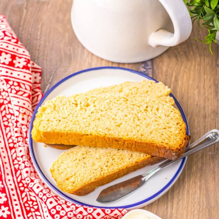 Slow cooker sourdough-style bread sliced to show soft, airy texture.