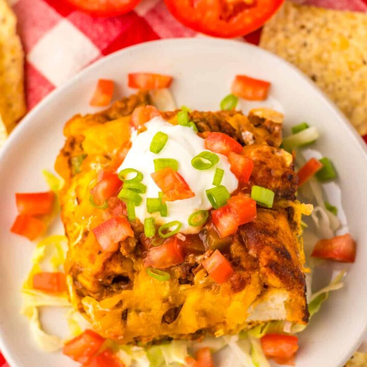 Overhead view of baked taco bubble up casserole topped with melted cheese.
