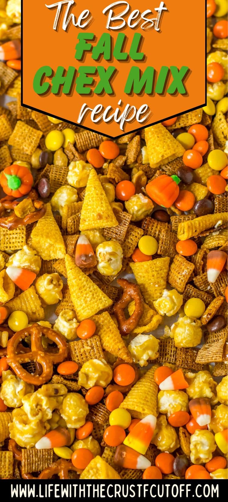 Bowl of fall-themed Chex mix with pretzels, candy corn, and chocolate pieces.