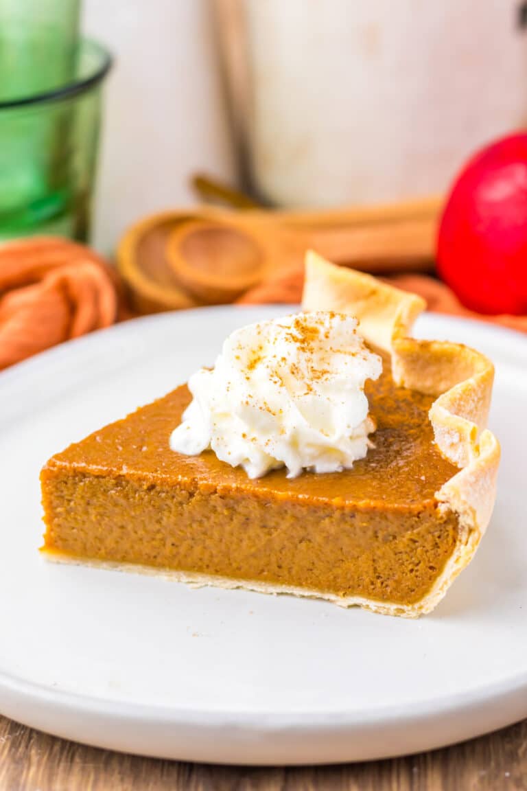 Close-up of Apple Butter Pie slice showing smooth custard filling and golden crust.
