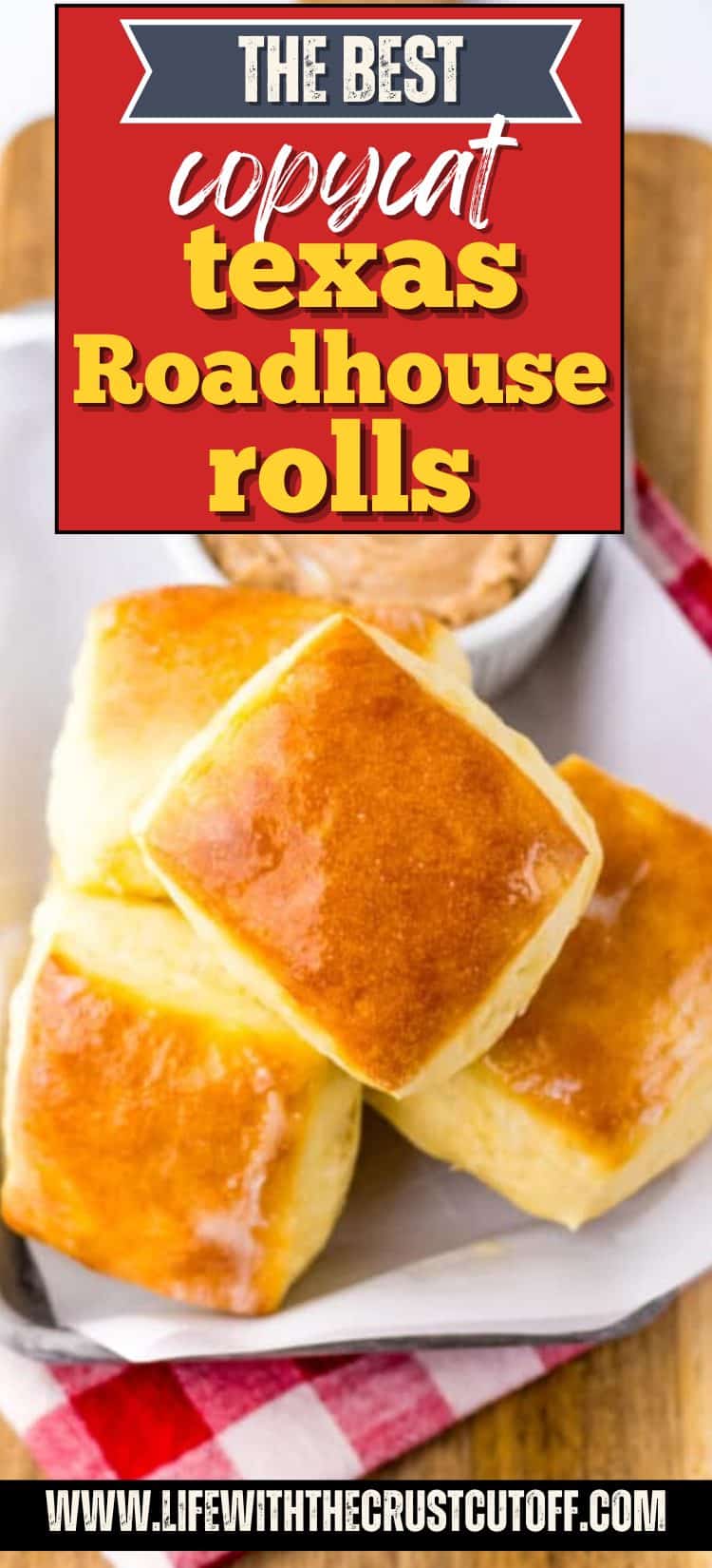 Golden Texas Roadhouse-style rolls piled on a tray with a side of cinnamon butter