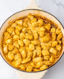 Chicken browned in pan for Marry Me Tortellini