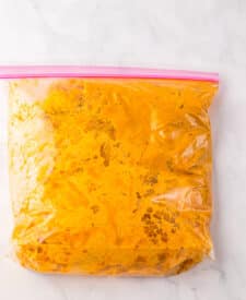 Chicken thighs and shawarma marinade in bag