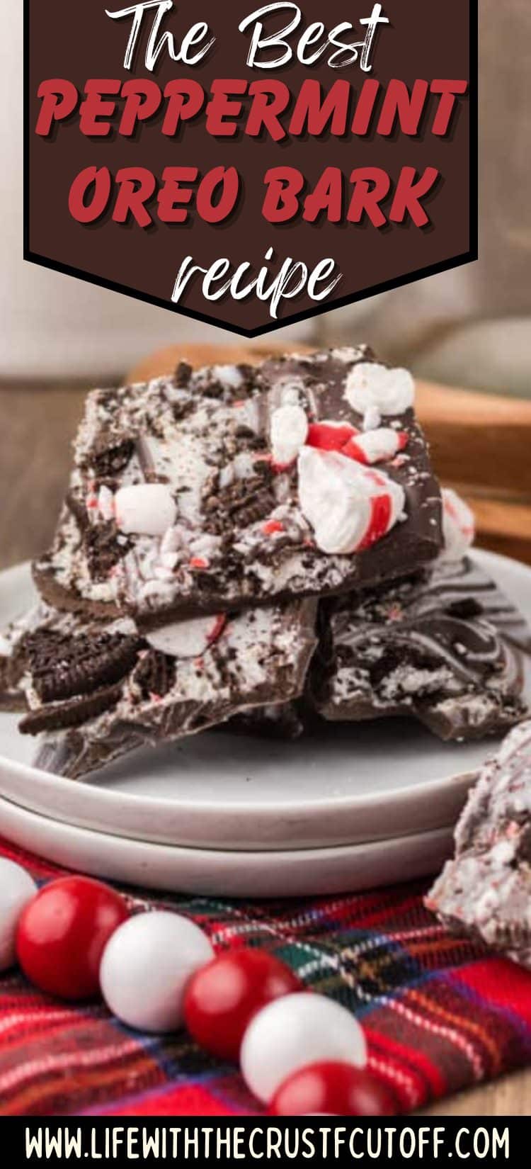 Peppermint Oreo bark with crushed candy canes and Oreo pieces on parchment paper.