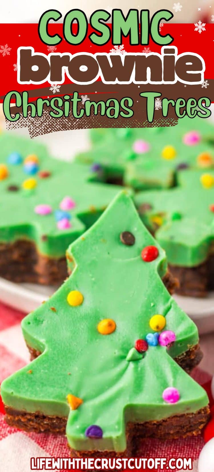 Festive Christmas tree shaped brownie treats with green topping and rainbow chocolate chips