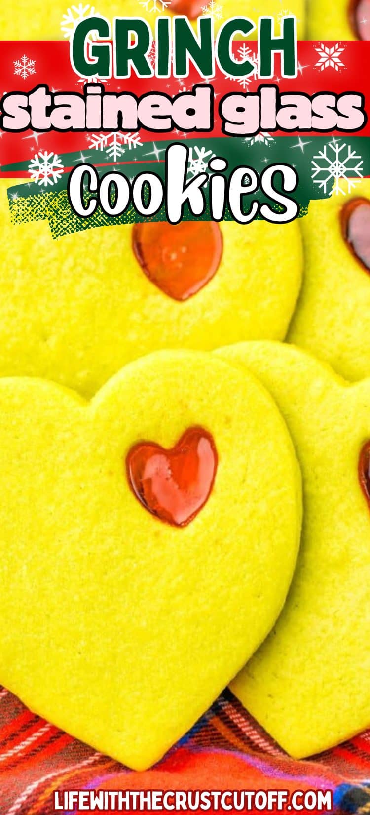 Grinch face cut-out cookies with melted candy centers