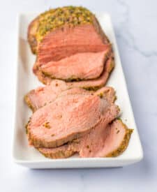 Medium Eye of Round Roast sliced on a plate