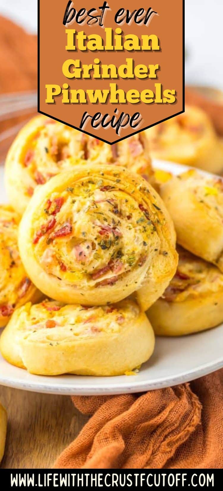 Italian Grinder Pinwheels with ham, salami, pepperoni, mozzarella, and banana peppers baked in flaky crescents