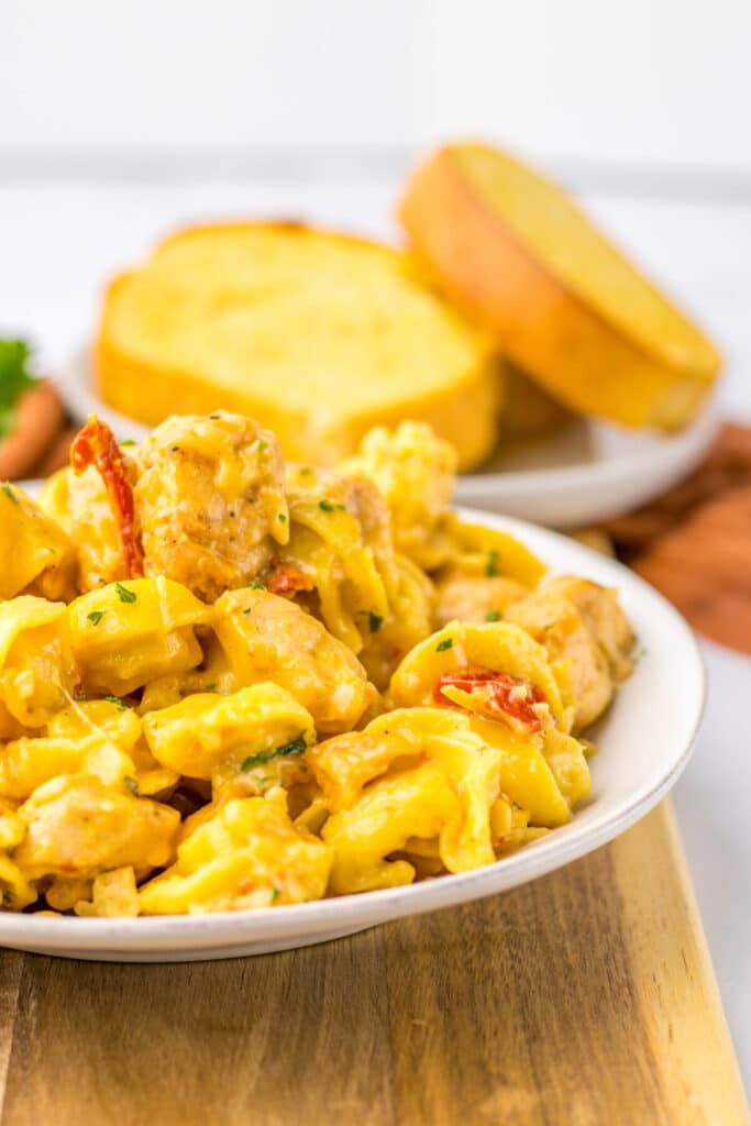 Creamy marry me chicken tortellini served in a bowl