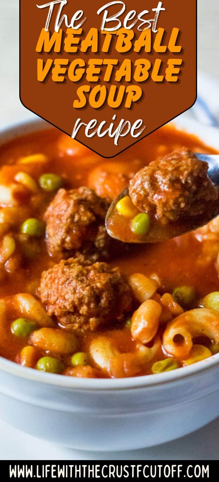 Hearty meatball vegetable soup with pasta and mixed vegetables in a rich tomato broth