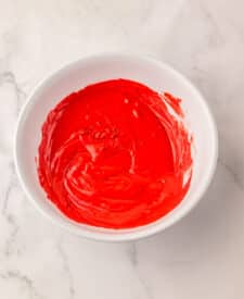 Raspberry brownie bombs red chocolate coating.