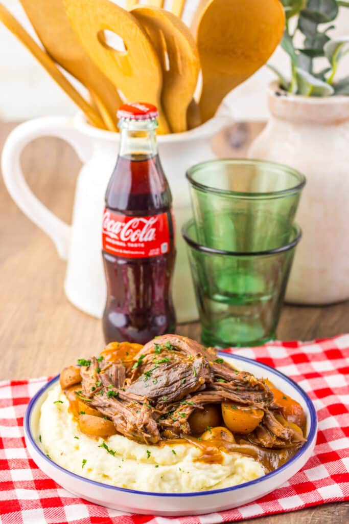 Homestyle slow cooker pot roast dinner with rich gravy