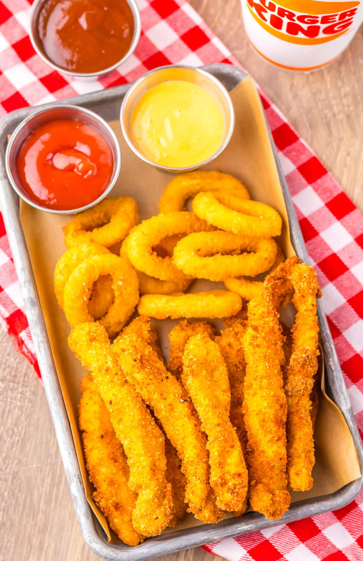 Copycat Burger King chicken fries served with ketchup and dipping sauces.