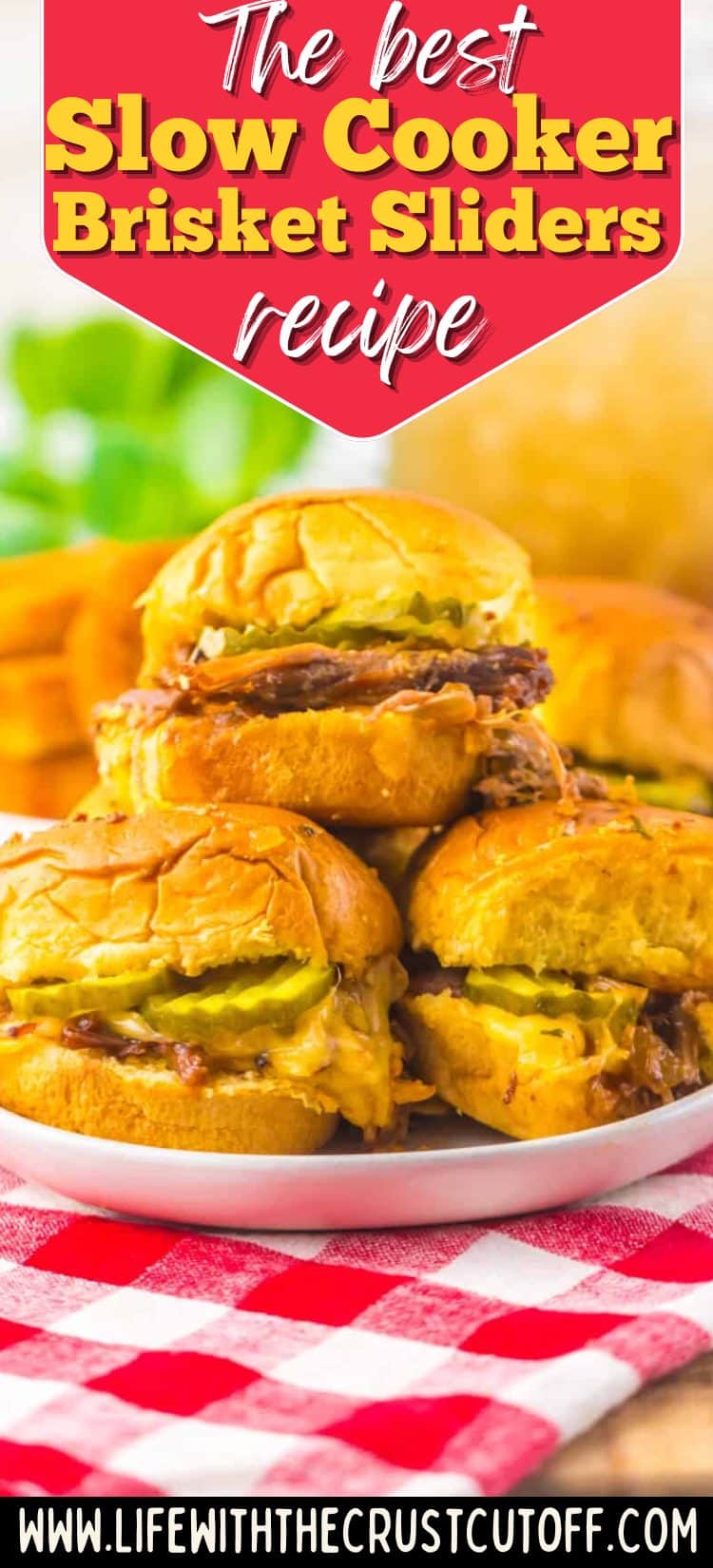 Slow cooker brisket sliders with tender shredded brisket on soft slider buns