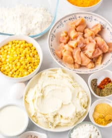 Ingredients for copycat KFC Famous Bowls including chicken, corn, mashed potatoes, and seasonings.
