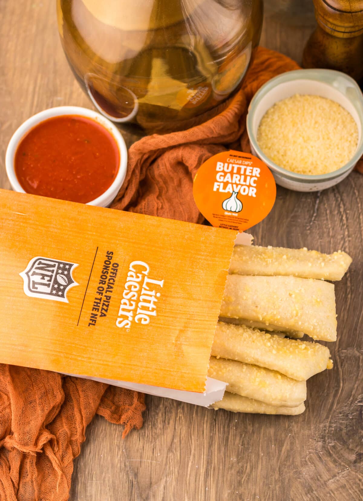 Copycat Little Caesar’s Crazy Bread served with marinara and cheese dipping sauce.