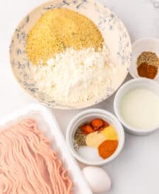 Ingredients for copycat Wendy’s spicy nuggets including ground chicken, spices, and breading.