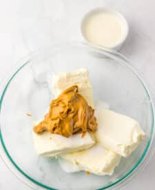 Cream cheese mixture being combined for no bake cheesecake.