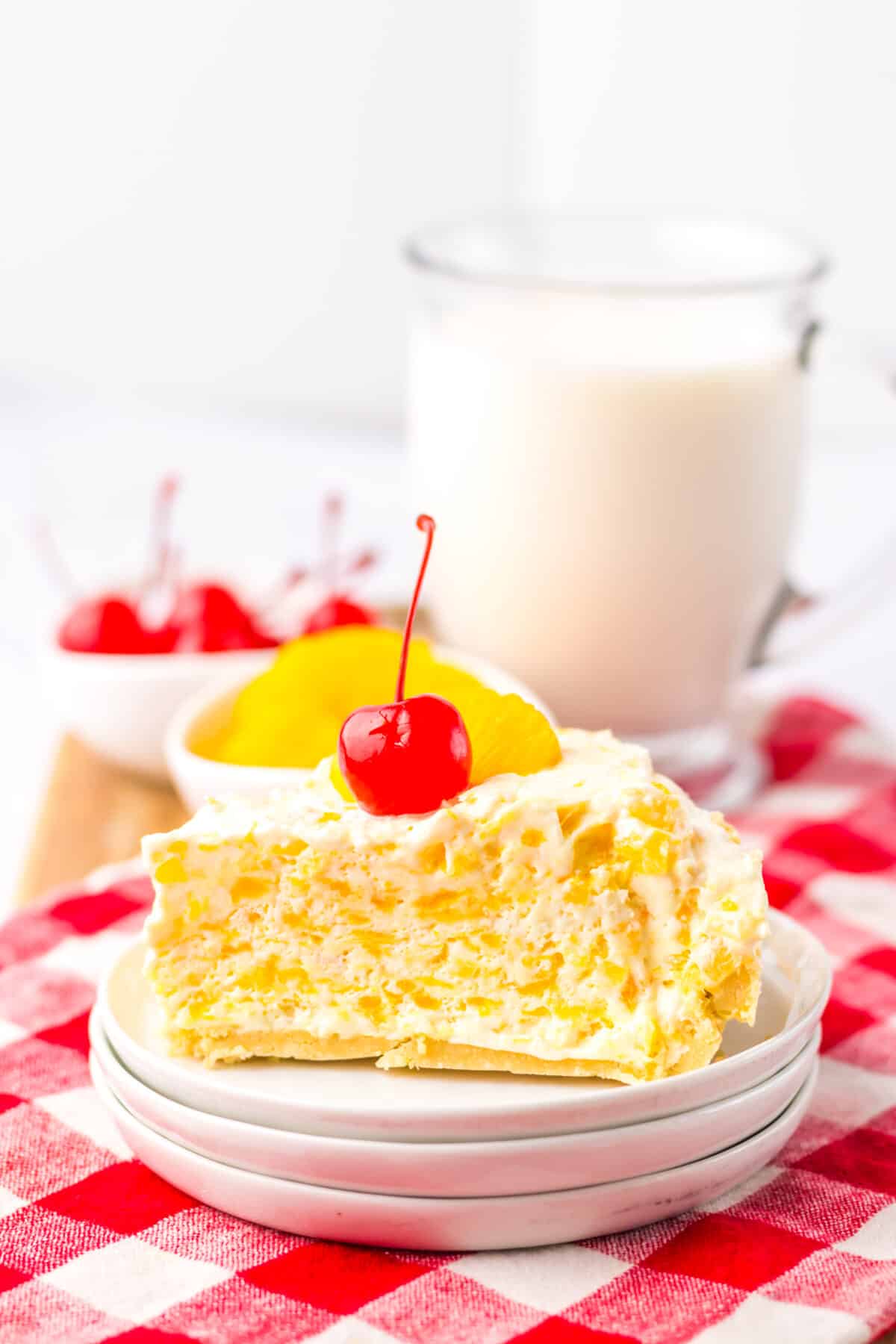 Close-up of creamy Pig Pickin Pie topped with cherries.
