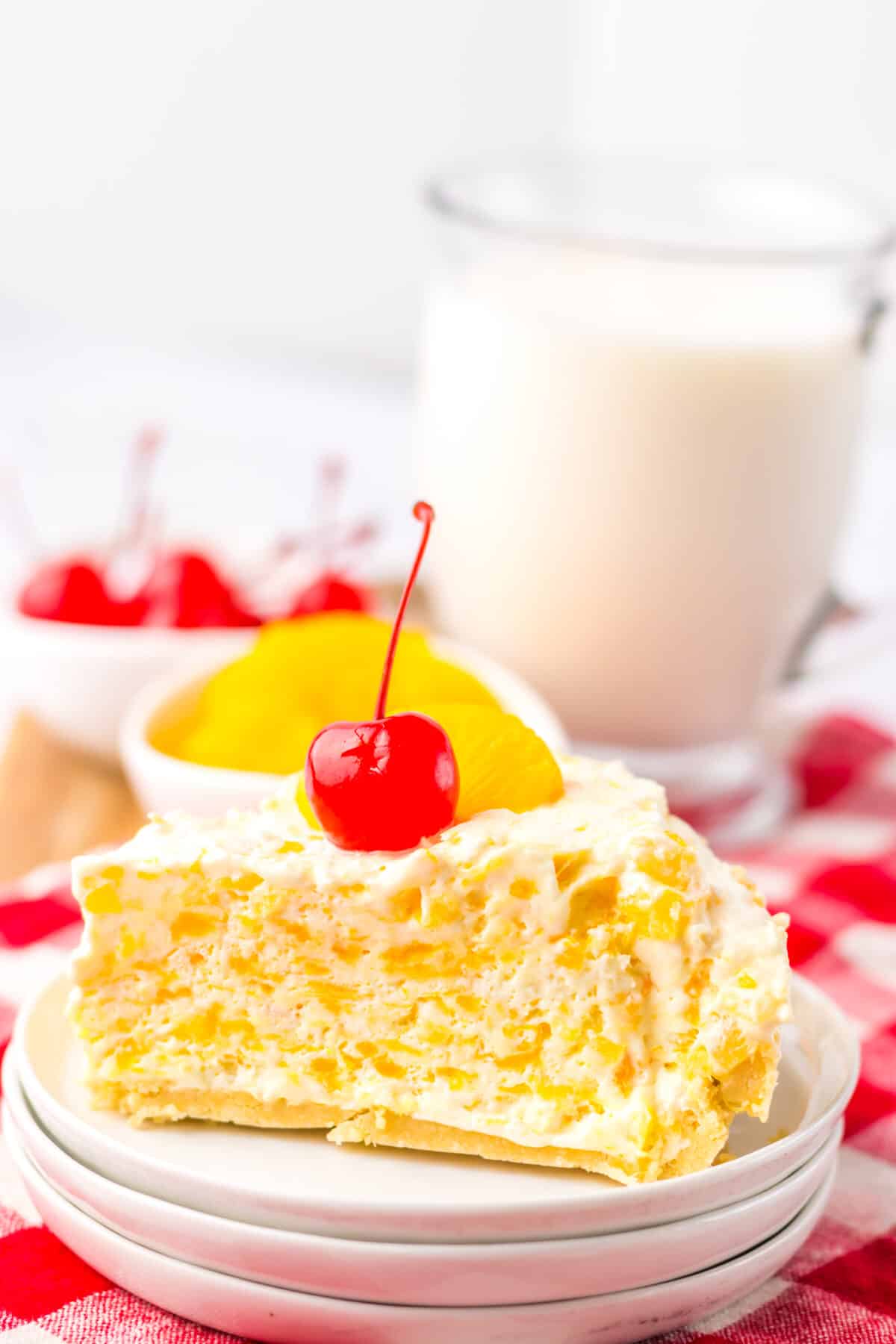 Close-up of creamy Pig Pickin Pie topped with cherries.