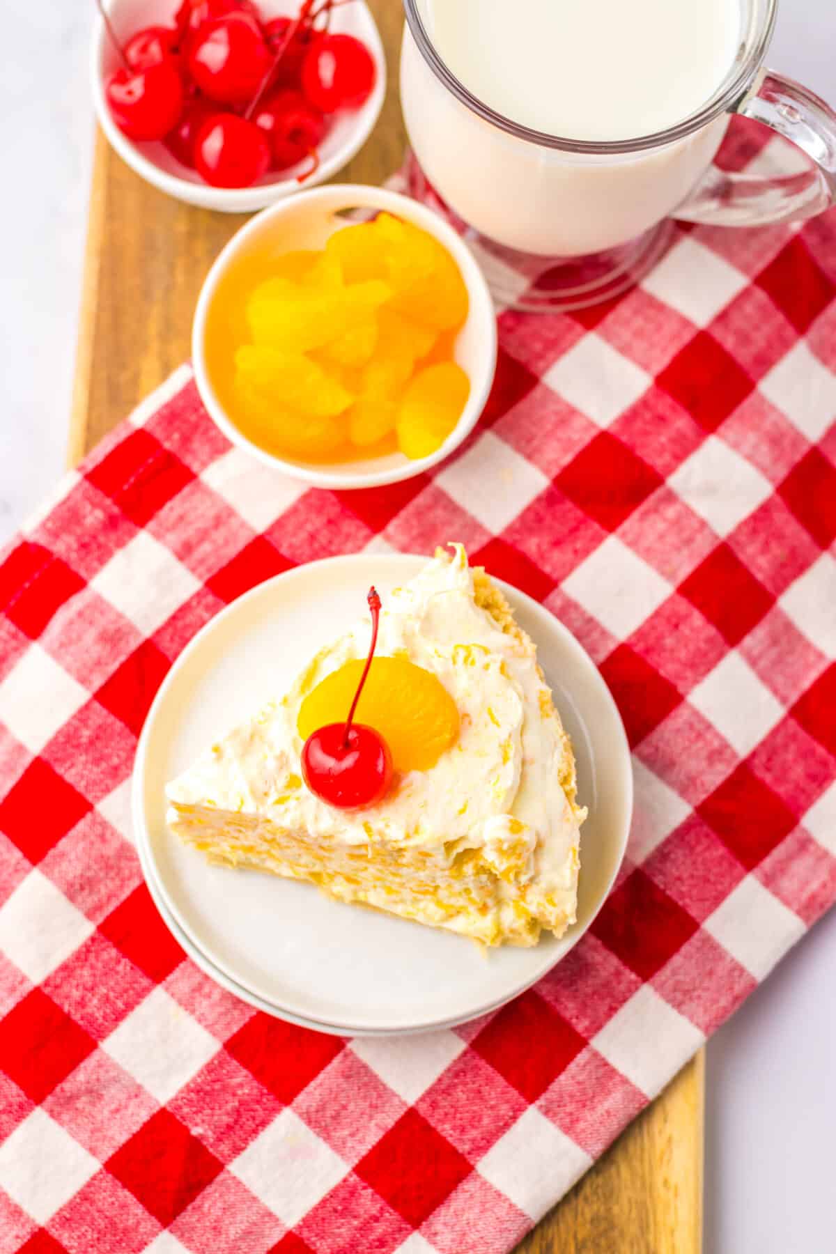 Slice of Pig Pickin Pie on a red gingham napkin.