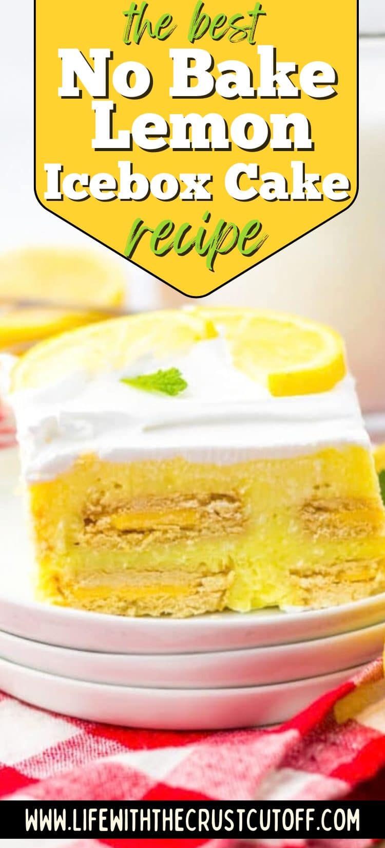 Lemon icebox cake with creamy lemon layers and graham crackers topped with whipped cream and lemon slices