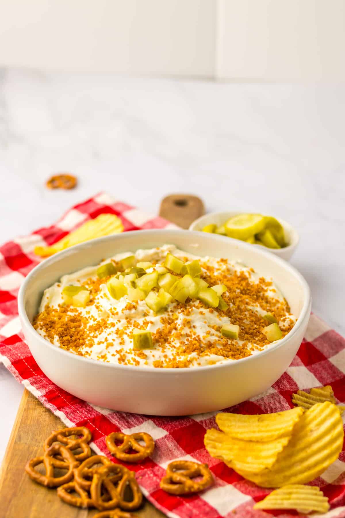 Creamy fried pickle dip garnished and ready to serve.