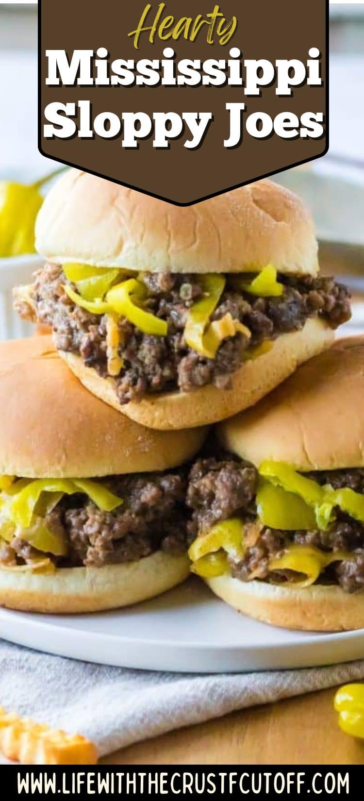Mississippi sloppy joes with shredded beef and sauce on sandwich buns