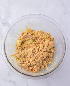 Ham salad mixture combined in a bowl until creamy.